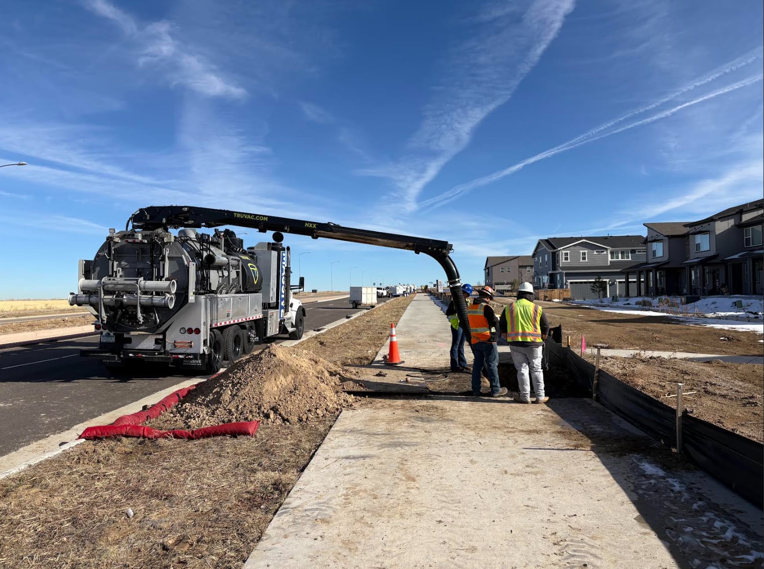 Hydrovac excavation in progress for utility daylighting project